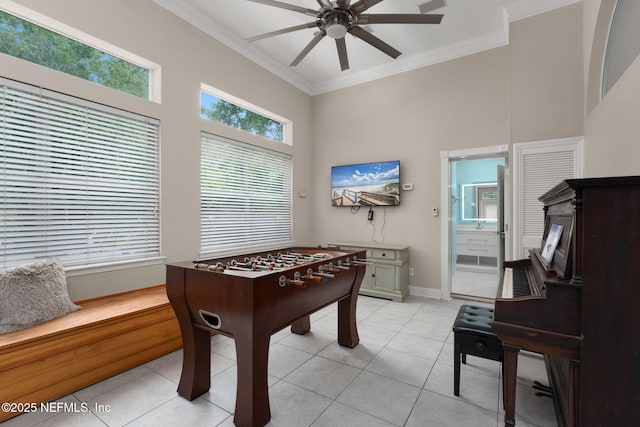 400 Big Tree Rd, Ponte Vedra Beach, FL 32082 - playroom featuring a ceiling fan, ornamental molding, a towering ceiling, light tile patterned floors, and baseboards