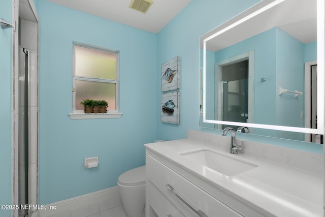 400 Big Tree Rd, Ponte Vedra Beach, FL 32082 - full bathroom featuring a shower with shower door, toilet, baseboards, vanity, and tile patterned floors