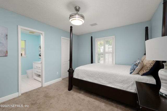 400 Big Tree Rd, Ponte Vedra Beach, FL 32082 - bedroom with carpet floors, baseboards, and ensuite bath