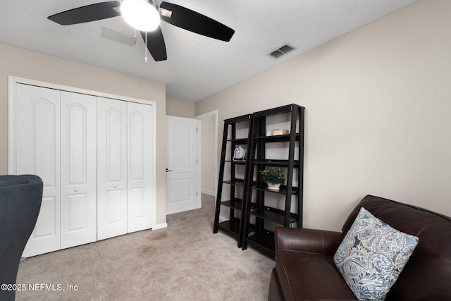 400 Big Tree Rd, Ponte Vedra Beach, FL 32082 - living area featuring a ceiling fan, carpet flooring, and a textured ceiling