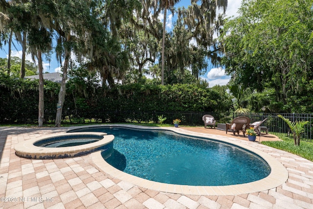 400 Big Tree Rd, Ponte Vedra Beach, FL 32082 - view of pool with fence, a pool with connected hot tub, and a patio