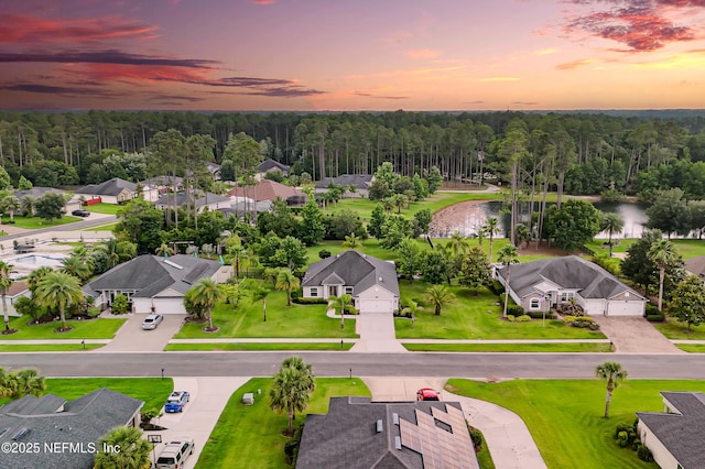 71 Irish Rose Rd, Saint Augustine, FL 32092 - aerial view at dusk of a water view, a wooded view, and a residential view