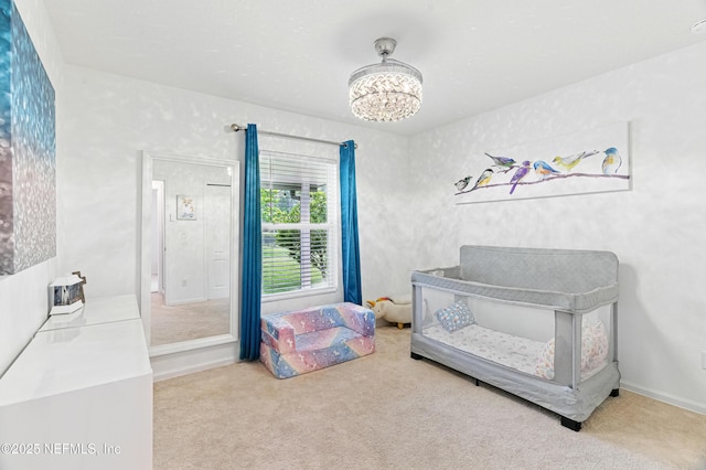 71 Irish Rose Rd, Saint Augustine, FL 32092 - carpeted bedroom with a chandelier