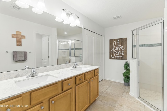 71 Irish Rose Rd, Saint Augustine, FL 32092 - full bathroom featuring a shower stall, double vanity, and tile patterned flooring