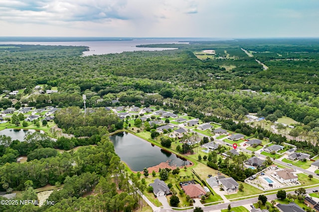 71 Irish Rose Rd, Saint Augustine, FL 32092 - aerial view of property and surrounding area with a large body of water, a heavily wooded area, and nearby suburban area
