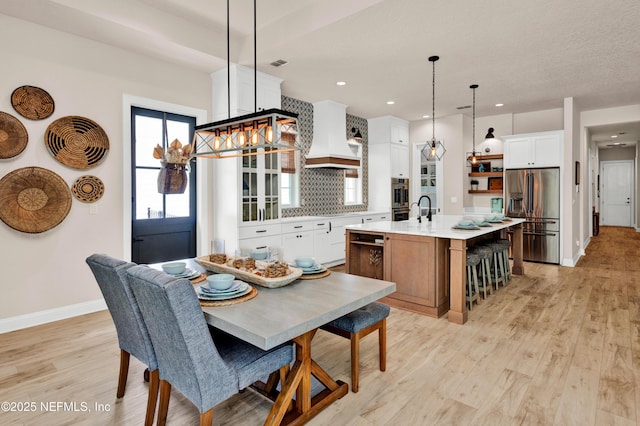 37 High Ridge Pt, Ponte Vedra, FL 32081 - dining room featuring light wood-style floors, baseboards, and recessed lighting