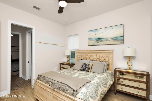 37 High Ridge Pt, Ponte Vedra, FL 32081 - bedroom with wood finished floors, baseboards, and ceiling fan