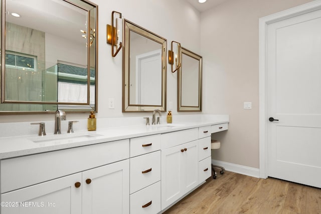 37 High Ridge Pt, Ponte Vedra, FL 32081 - full bathroom with double vanity, a stall shower, baseboards, and wood finished floors