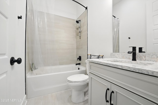 full bath with toilet, shower / bath combo, and vanity