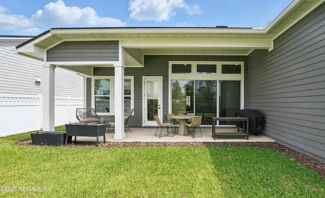back of house with a patio