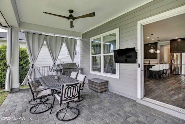 252 Pine Haven Dr, Saint Johns, FL 32259 - view of patio / terrace with ceiling fan, outdoor dining space, a grill, and exterior kitchen
