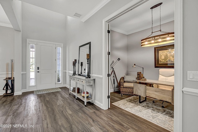 252 Pine Haven Dr, Saint Johns, FL 32259 - foyer with dark wood-style floors, crown molding, and baseboards