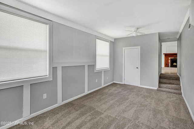 3733 Cambay Pl, Jacksonville, FL 32210 - carpeted spare room featuring a ceiling fan and baseboards