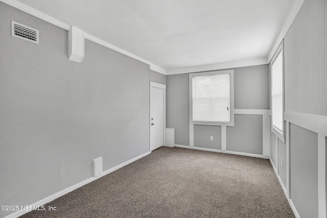 3733 Cambay Pl, Jacksonville, FL 32210 - spare room with carpet floors, baseboards, and crown molding