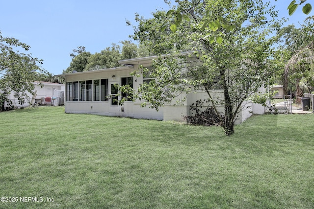 3733 Cambay Pl, Jacksonville, FL 32210 - back of house with a sunroom