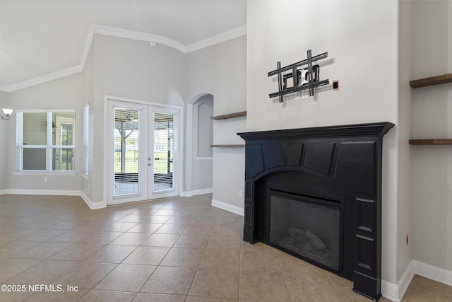 1456 Coopers Hawk Way, Middleburg, FL 32068 - unfurnished living room with french doors, tile patterned floors, baseboards, ornamental molding, and a glass covered fireplace