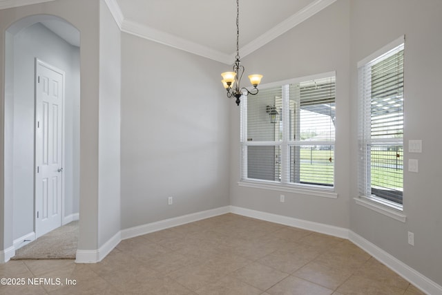 1456 Coopers Hawk Way, Middleburg, FL 32068 - unfurnished dining area featuring a chandelier, arched walkways, crown molding, baseboards, and lofted ceiling