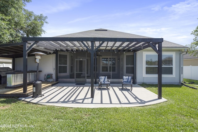 1456 Coopers Hawk Way, Middleburg, FL 32068 - rear view of house with a pergola, a patio area, roof with shingles, a sunroom, and stucco siding