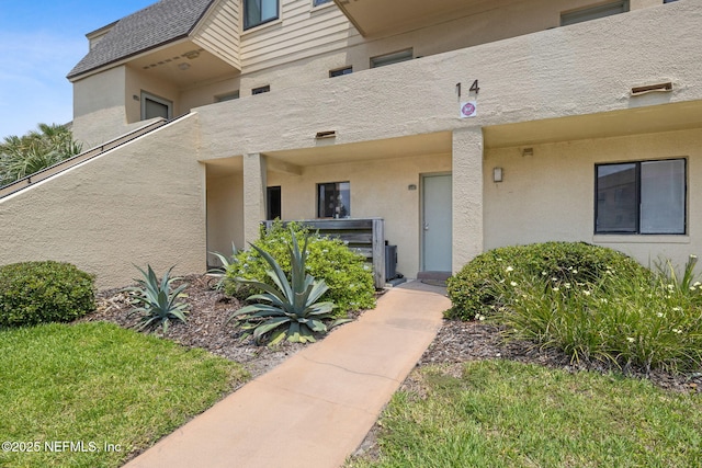 8550 A1A S Unit 340, Saint Augustine, FL 32080 - doorway to property featuring stucco siding