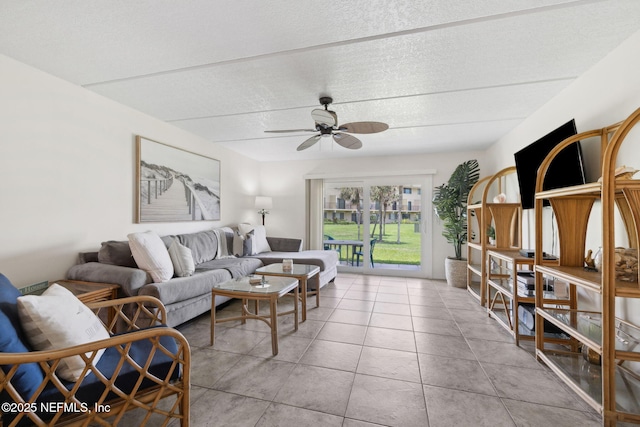 8550 A1A S Unit 340, Saint Augustine, FL 32080 - tiled living room featuring a ceiling fan and a textured ceiling