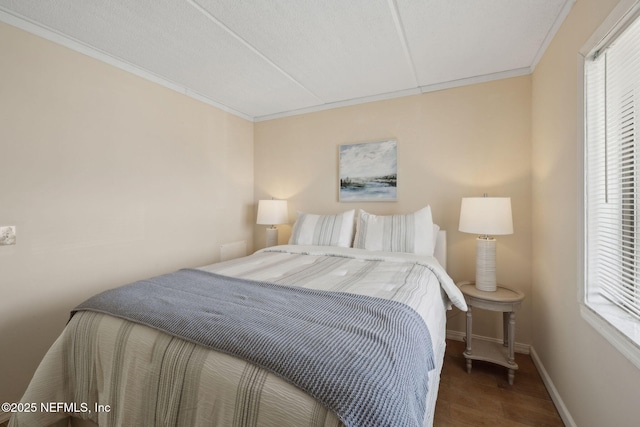 8550 A1A S Unit 340, Saint Augustine, FL 32080 - bedroom with baseboards, wood finished floors, and crown molding