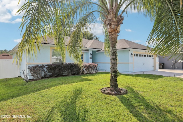 3228 Deer Creek Dr, Middleburg, FL 32068 - ranch-style house featuring stucco siding, an attached garage, and driveway