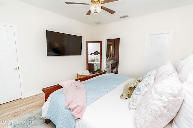 4282 Wolfe Dr, Macclenny, FL 32063 - bedroom with wood finished floors, a ceiling fan, and baseboards