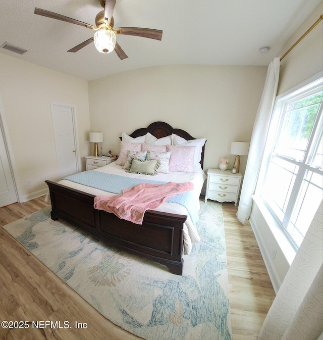 4282 Wolfe Dr, Macclenny, FL 32063 - bedroom featuring light wood-style flooring, ceiling fan, and baseboards