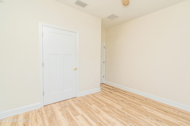 4282 Wolfe Dr, Macclenny, FL 32063 - unfurnished bedroom featuring light wood-style flooring and baseboards