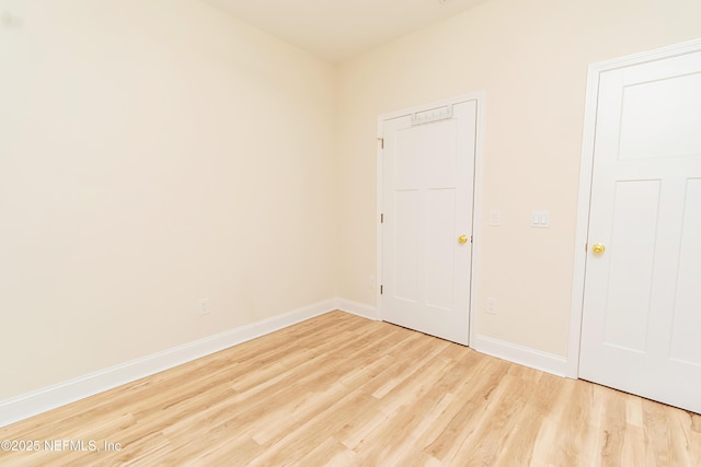 4282 Wolfe Dr, Macclenny, FL 32063 - empty room with light wood-style floors and baseboards