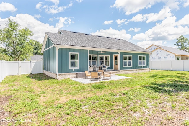 4282 Wolfe Dr, Macclenny, FL 32063 - rear view of property with a gate, a shingled roof, a patio, board and batten siding, and ceiling fan