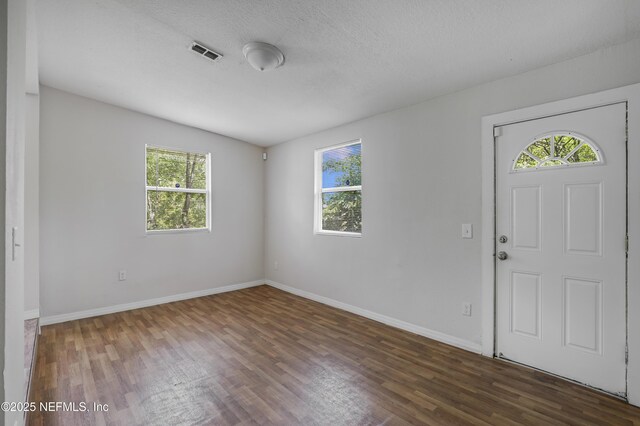 944 Bunker Hill Blvd, Jacksonville, FL 32208 - foyer with wood finished floors and baseboards