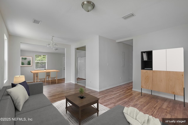 944 Bunker Hill Blvd, Jacksonville, FL 32208 - living room with light wood finished floors and baseboards
