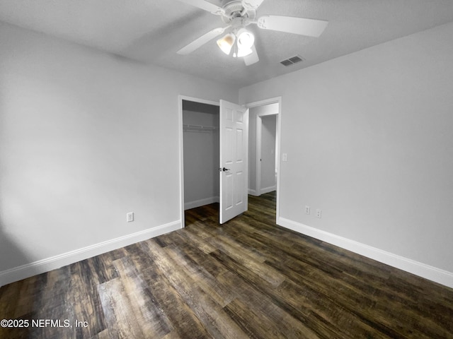 3055 Nautilus Rd, Middleburg, FL 32068 - unfurnished bedroom with baseboards, dark wood-style floors, a closet, and ceiling fan