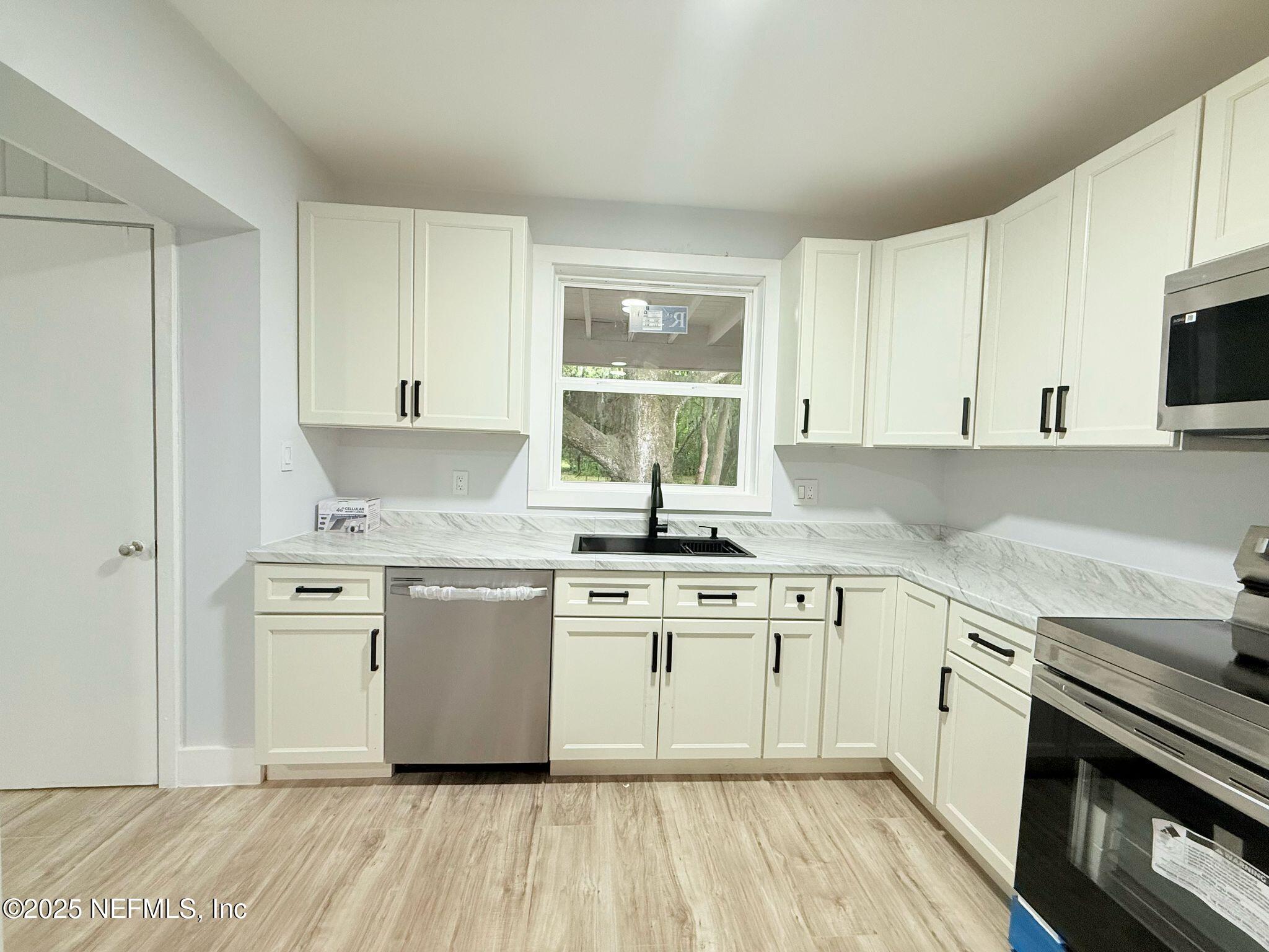 576 E 59th St, Jacksonville, FL 32208 - photo 13