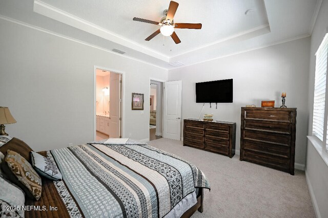 152 Cloverbrook Rd, Saint Johns, FL 32259 - carpeted bedroom with a raised ceiling, crown molding, a ceiling fan, baseboards, and ensuite bathroom