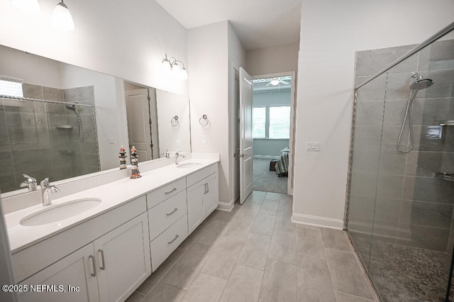 152 Cloverbrook Rd, Saint Johns, FL 32259 - full bathroom featuring a stall shower, double vanity, ceiling fan, tile patterned floors, and baseboards