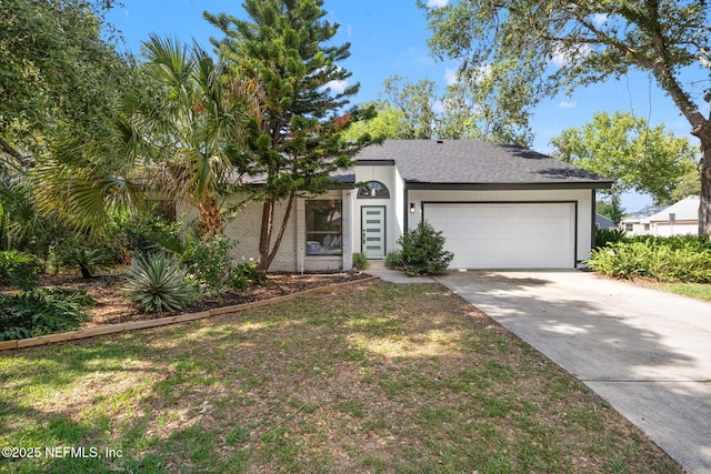 550 Robles Ln, Ponte Vedra Beach, FL 32082 - view of front of home with an attached garage, driveway, roof with shingles, and brick siding