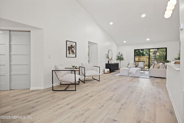 550 Robles Ln, Ponte Vedra Beach, FL 32082 - living area with high vaulted ceiling, light wood-type flooring, recessed lighting, and baseboards