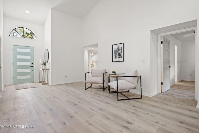 550 Robles Ln, Ponte Vedra Beach, FL 32082 - foyer with wood finished floors, a towering ceiling, and baseboards