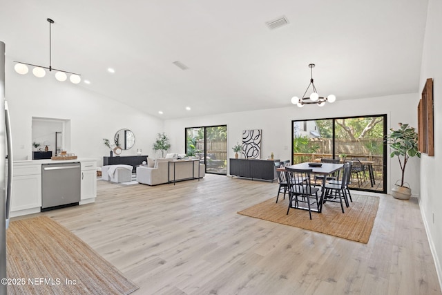 550 Robles Ln, Ponte Vedra Beach, FL 32082 - dining room featuring a chandelier, light wood-style floors, healthy amount of natural light, recessed lighting, and high vaulted ceiling
