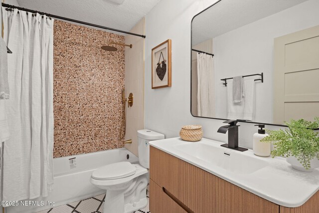 550 Robles Ln, Ponte Vedra Beach, FL 32082 - full bath with vanity, shower / tub combo, toilet, tile patterned flooring, and a textured ceiling