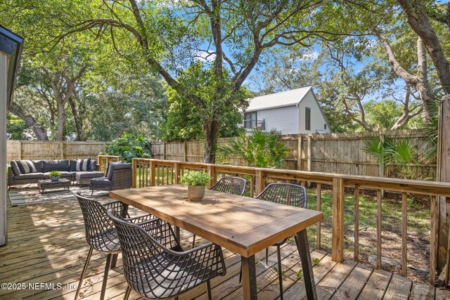 550 Robles Ln, Ponte Vedra Beach, FL 32082 - wooden deck featuring a fenced backyard, an outdoor hangout area, and outdoor dining space