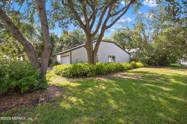 550 Robles Ln, Ponte Vedra Beach, FL 32082 - view of property exterior with a yard and a garage