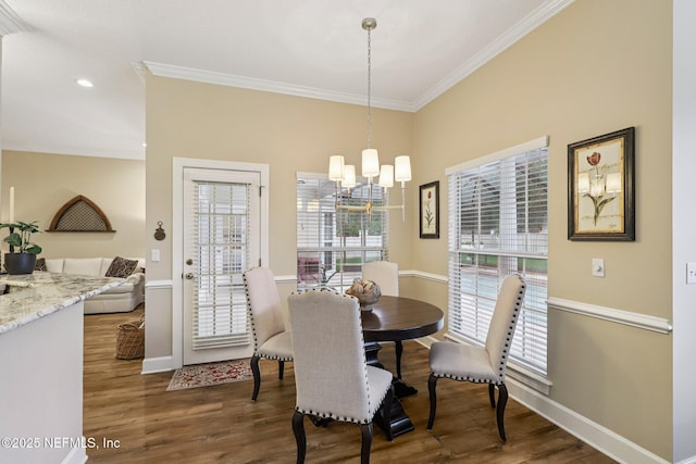 641 Thornwood Ln, Orange Park, FL 32073 - dining space featuring crown molding, a chandelier, wood finished floors, baseboards, and recessed lighting