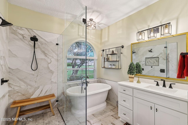 641 Thornwood Ln, Orange Park, FL 32073 - bathroom with a marble finish shower, vanity, tile walls, a soaking tub, and marble look tile flooring