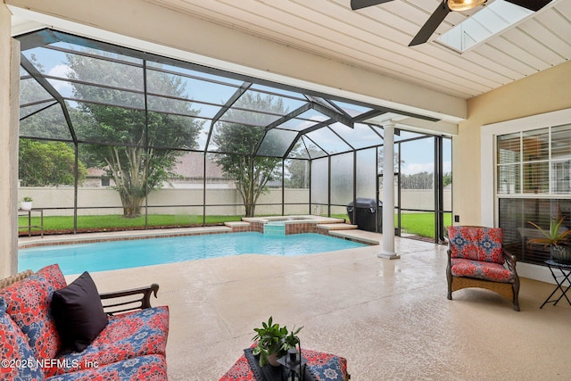 641 Thornwood Ln, Orange Park, FL 32073 - view of pool featuring a ceiling fan, a patio, a pool with connected hot tub, and a lanai
