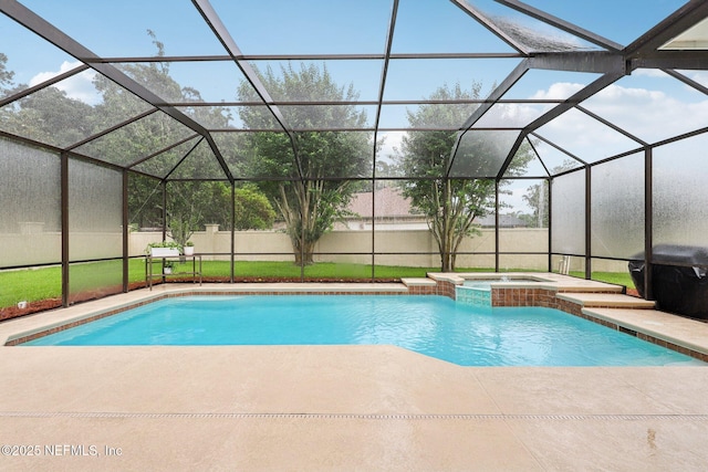 641 Thornwood Ln, Orange Park, FL 32073 - view of pool with a patio area, glass enclosure, and a pool with connected hot tub