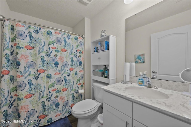 4101 Spring Creek Ln, Middleburg, FL 32068 - bathroom featuring vanity, toilet, wood finished floors, a textured ceiling, and curtained shower