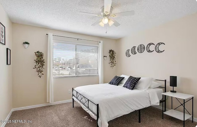 11523 Dunes Way Dr N, Jacksonville, FL 32225 - bedroom with carpet flooring, a textured ceiling, baseboards, and ceiling fan